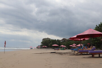 beach with umbrellas and chairs, Bali