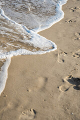 Sea or ocean tropical landscape view. Sea waves under the sun. Summer vacation and travel concept. Water wave surface. Sand beach. 
