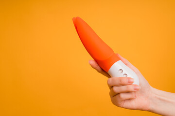 Sex toy for adult, design dildo vibrator isolated on yellow background
