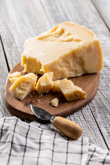 Pieces of italian parmesan cheese. Block of parmesan