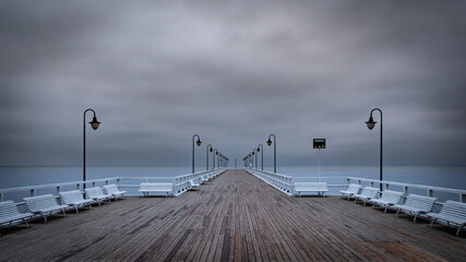 An old wooden pier in Gdynia Orlowo on the morning in July. 