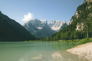Fototapeta na wymiar The gorgeous alpine world around the turquoise lake is very popular. Among others, Lake Landro - 