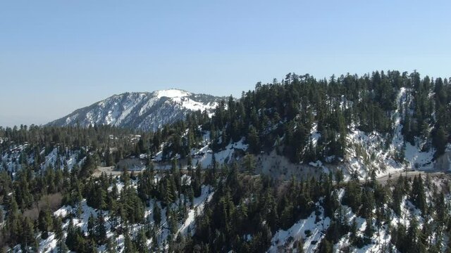 Winter Snow Forest Aerial Shot of San Bernardino Mountains Ski Trails Telephoto L California USA