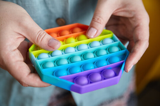 Push Pop Bubble Sensory Fidget Toy In Hands