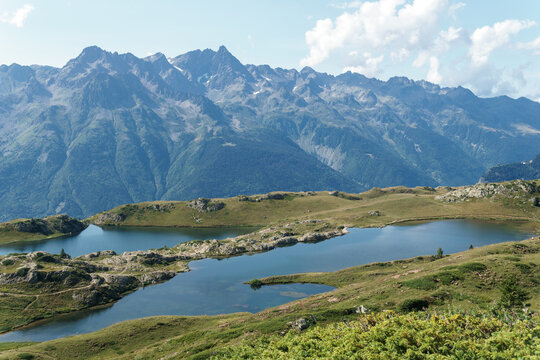 Lake le Lac Besson, Alpes d'Huez. French Alps. Reflection and blue sky. 