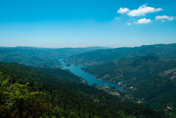 Fototapeta na wymiar Pedra Bela viewpoint with a panorama of Cavado River from afar in the National Park of Peneda Geres, Portugal