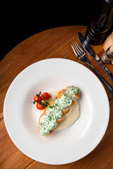 Sliced chicken cordon bleu with creamy sauce