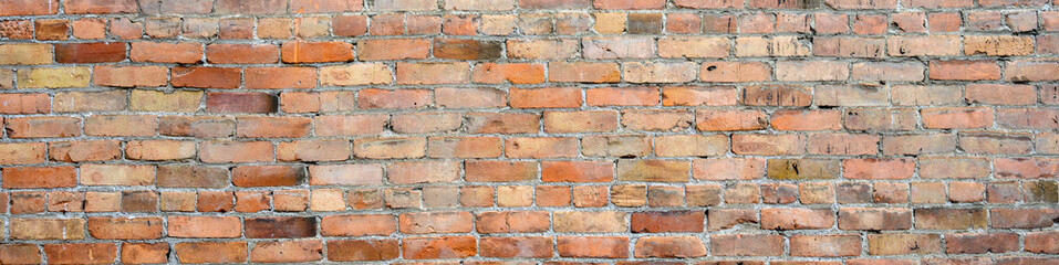 Obraz premium Brick wall as a rough textured and patterned abstract background 