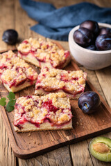 Juicy plum pie slices with crunchy streusel topping