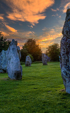 Neolithic stone circle at Avebury in Wiltshire England. Sunset.
