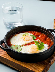 shakshuka scrambled eggs with tomatoes in Arabic