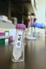 Close-up of laboratory tube, selective focus