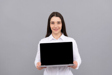 woman showing laptop screen. modern wireless laptop. webinar pc advertisement.