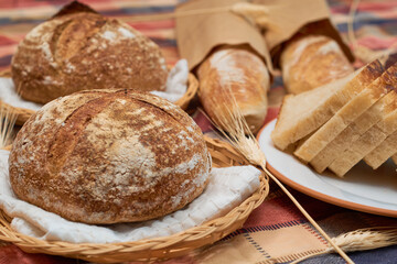 Variety of fresh Homemade Sourdough Bread on a rustic background
