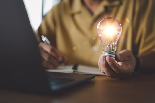 Innovation. Hands holding light bulb for Concept new idea concept with innovation and inspiration, innovative technology in science and communication concept,.