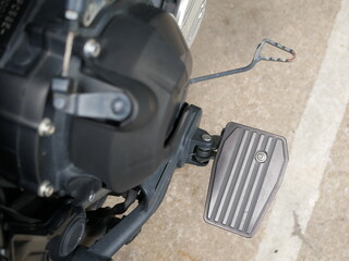 front motorcycle footrest on a modern motorcycle.
