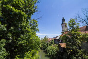 Panorama of the Selska sora river with the Church of Saint Jacob, or Cerkev Svetega Jacoba, in...