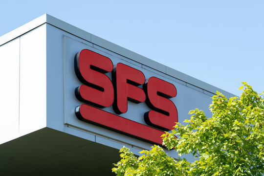 Hamilton, On, Canada - August 22, 2021: Close up of SFS sign on the building in Hamilton, On, Canada. SFS is a worldwide leading supplier of mechanical fastening systems and precision components.