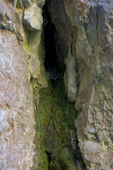 hole in a rock wall