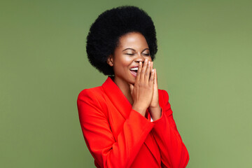 Elegant african businesswoman excited covering happy smile and open mouth with hands. Surprised...