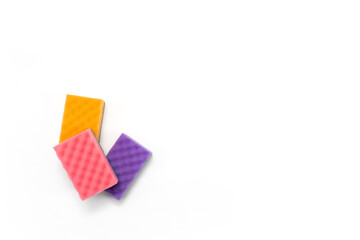 Colorful sponges isolated on white background. Cleaning sponge.
Close-up. House cleaning.