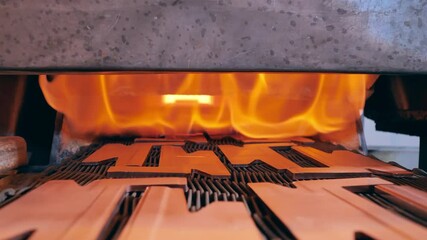 Small copper elements are getting burnt on the conveyor