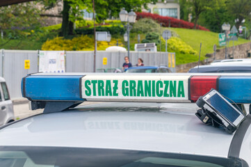 Sign Polish Border Guard (Polish Straz Graniczna, also abbreviated as SG).