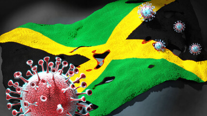 Covid in Jamaica - coronavirus attacking a national flag of Jamaica as a symbol of a fight and struggle with the virus pandemic in this country, 3d illustration