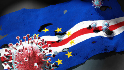 Covid in Cabo Verde - coronavirus attacking a national flag of Cabo Verde as a symbol of a fight and struggle with the virus pandemic in this country, 3d illustration