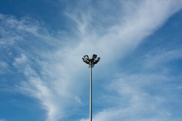 street lamp against blue sky