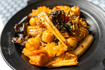 Chinese spicy stir-fried food with many ingredients Malaxianguo.