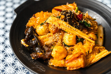 Chinese spicy stir-fried food with many ingredients Malaxianguo.