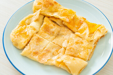roti with egg and sweetened condensed milk