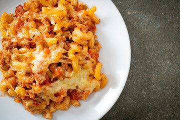 homemade macaroni bolognese with cheese