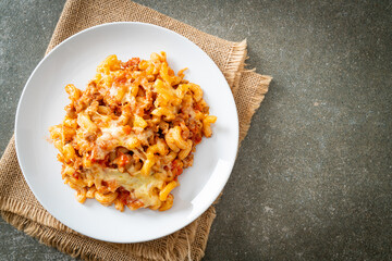 homemade macaroni bolognese with cheese