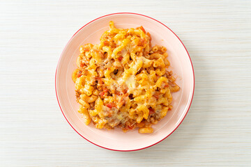 homemade macaroni bolognese with cheese