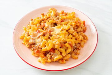 homemade macaroni bolognese with cheese