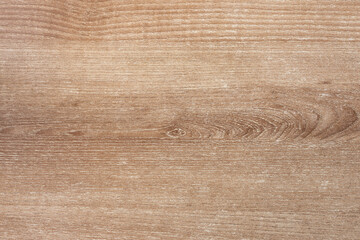 Light brown wooden background top view. Wooden texture closeup.