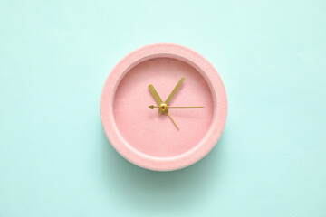 Alarm clock on color background