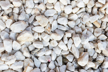 Rubble or gravel background, construction material. Pile of many small stones, stock photo