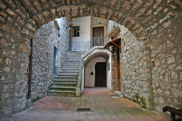 Fototapeta premium Entrance arch in an old house in the historic center of Castelsaraceno, an old town in the Basilicata region, Italy.