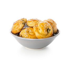 Puff pastry stuffed with spinach on white background