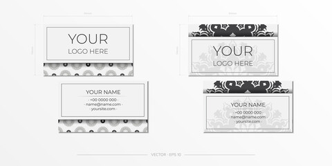 Vector business cards with vintage ornament. Vector Template for print design of business cards in white color with greek luxury ornaments.