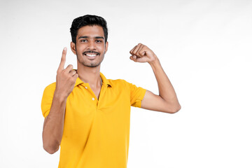 Young indian man showing expression with hand on white background