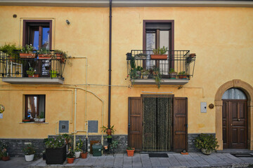 Facade of an old house in the historic center of Castelsaraceno, an old town in the Basilicata region, Italy.
