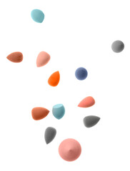 Set of cosmetic sponges on white background