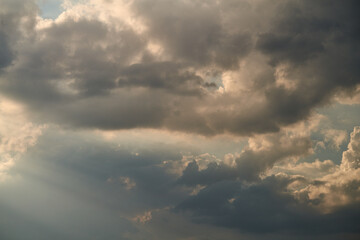Fototapeta na wymiar dramatic clouds float across the blue sky