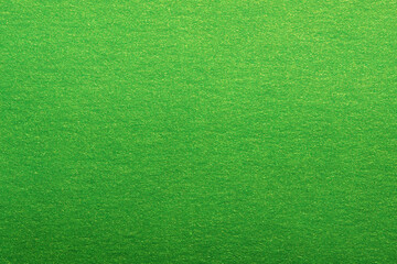 Texture of green shiny metallic paper