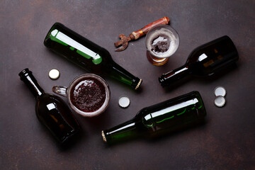 Beer bottles, lager beer glass and mug, bottle opener