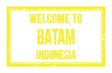 WELCOME TO BATAM - INDONESIA, words written on yellow rectangle stamp